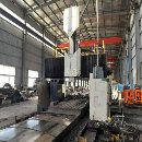 海天5米龙门，工作台2米5米，门宽2.8，门高1.3，带4个.